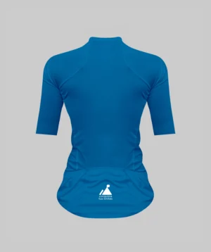 Camiseta de ciclismo para mujer en color índigo, vista desde la espalda, con el logo de la marca Natural en la parte inferior.